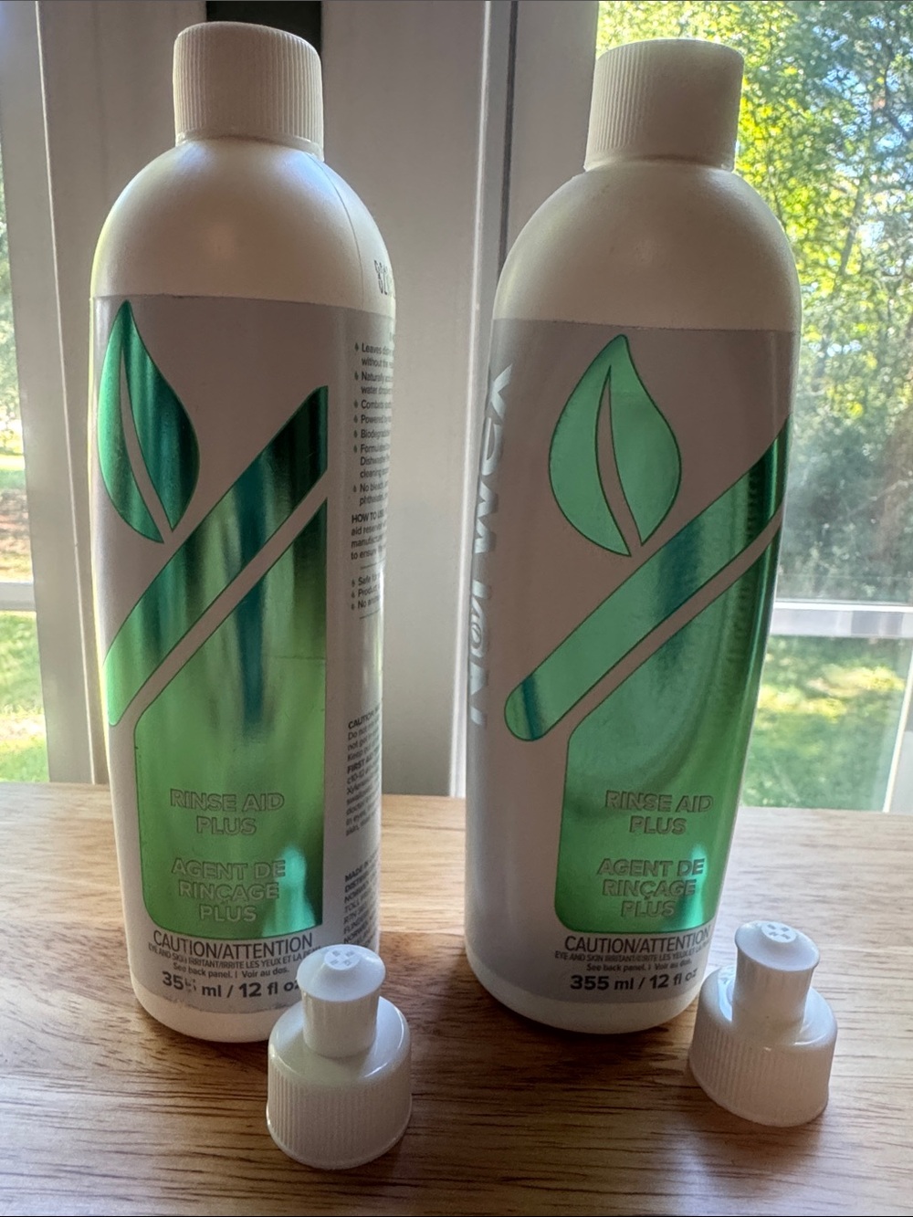 Norwex Rinse Aid Plus Bottles in Metallic Green and White
